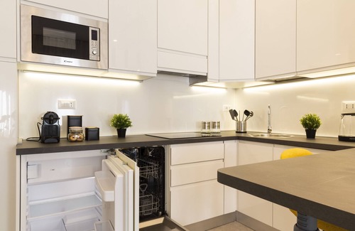 Giambellino Apartment | Top-Rated notaMi in Flower District with Family-Friendly Amenities