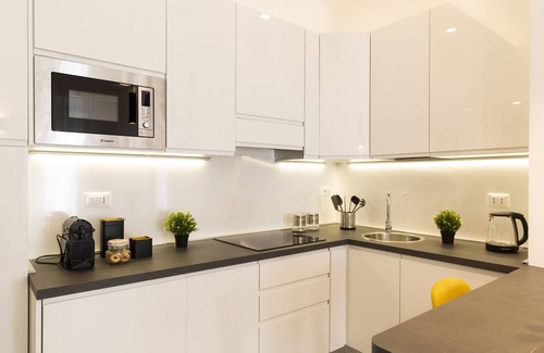 Giambellino Apartment | Top-Rated notaMi in Flower District with Family-Friendly Amenities