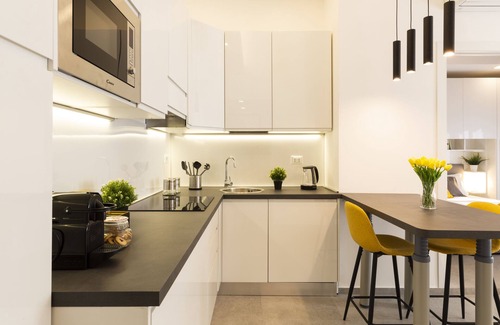 Giambellino Apartment | Top-Rated notaMi in Flower District with Family-Friendly Amenities