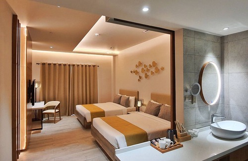 Mahinog Hotel | Discover Nouveau Resort: Family-Friendly with Spa & Pool