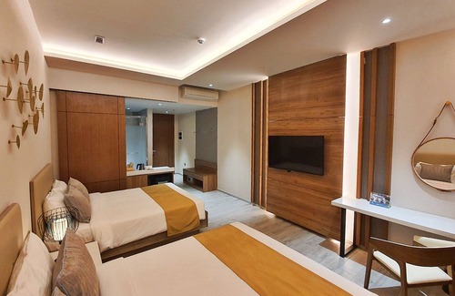 Mahinog Hotel | Discover Nouveau Resort: Family-Friendly with Spa & Pool