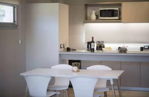 Las Gaviotas Hotel | Relax at Nova Pampa Apart & Spa with Pool and Dining