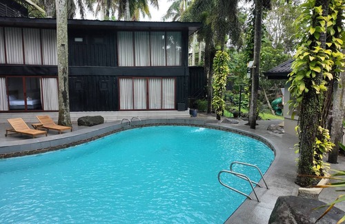 Canlubang Bed & Breakfast | Novella Tagaytay Deluxe King 103 Pool View