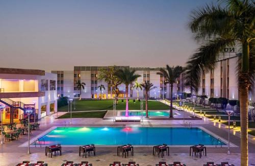 An-Nuzhah Hotel | Discover Novotel Cairo Airport with Pool and Spa Amenities