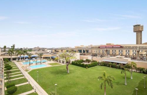 An-Nuzhah Hotel | Discover Novotel Cairo Airport with Pool and Spa Amenities