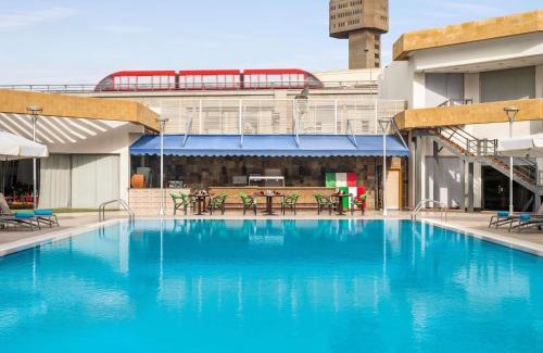 An-Nuzhah Hotel | Discover Novotel Cairo Airport with Pool and Spa Amenities