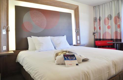 Carquefou Hotel | Inviting Novotel Nantes Carquefou: Family-Friendly Retreat