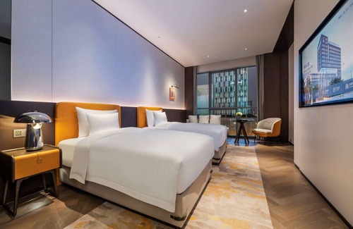 Weiyang Hotel | Discover Novotel Xian Xixian: Family-Friendly Getaway