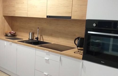 Krzyki Apartment | Modern Riverside Apartment in Wrocław with Parking & Amenities