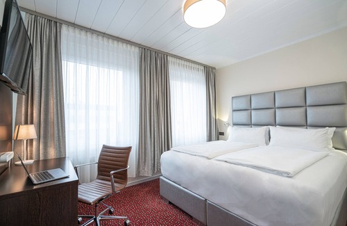 Dortmund City Centre Hotel | Cozy NP Hotel Königshof: Family-Friendly & Accessible Stay