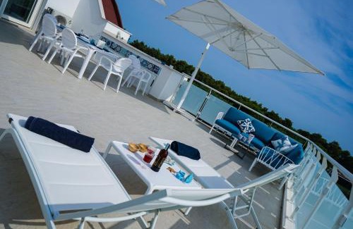 Lido di Campomarino Apartment | Experience NSM Blumarine: Private Beach & Ocean Views