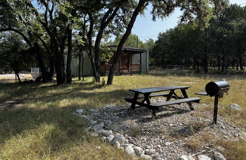 Barksdale Cabin | Discover Nueces River Cabins: Cozy Oak Retreats Await