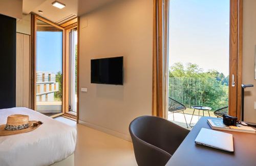 San Sebastian Apartment | Discover Numad Studios: Family-Friendly 4-Star Retreat