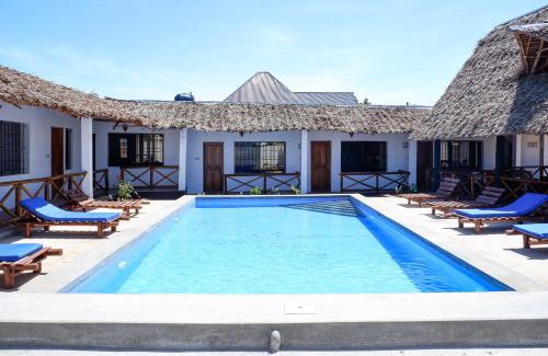 Nungwi Hotel | Discover Nungwi Heritage Resort: Pool, Breakfast & Family Fun
