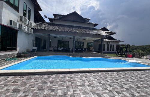 Cherating Hotel | Budget-Friendly Nurbayu Chalet: Child Friendly Retreat