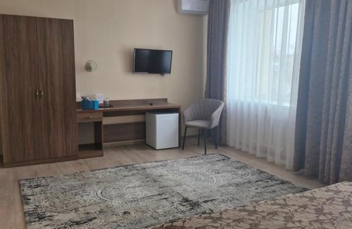 Pavlodar Hotel | Budget-Friendly Nurtau: Family-Friendly Hotel with Dining