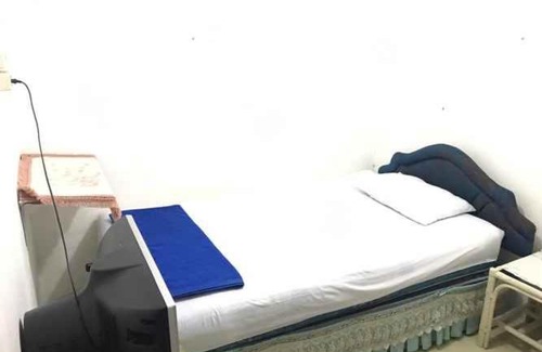 Mampang Prapatan House | Budget-Friendly Nusalink Hotel Near Pancoran Awaits You