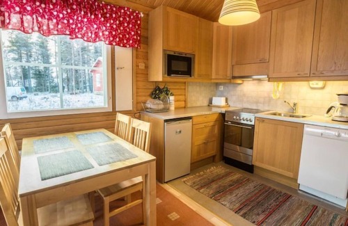 Akaslompolo House | Tranquil Nutukas: Lake View & Spa Retreat Awaits You