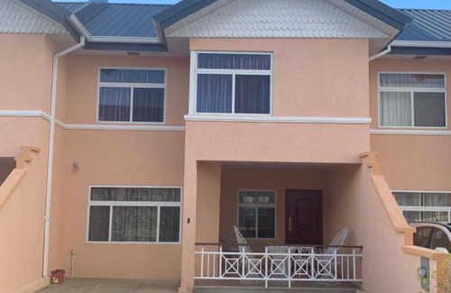 Buccoo Villa | Discover Nzingha's Villa: 4-Star Stay with Pool Access