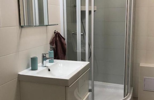 Fertoszentmiklos Apartment | Discover Oázis Apartmanház: Perfect for Families and Pets