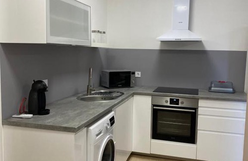 Fertoszentmiklos Apartment | Discover Oázis Apartmanház: Perfect for Families and Pets