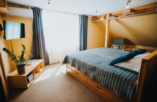 Pavilosta Apartment | Family Oasis: 4-Star Retreat with Hot Tub & Top Ratings