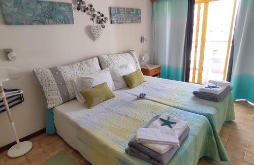 Praia da Rocha Apartment | O Cantinho da Rocha - Unmatched Ocean View & Pool Access