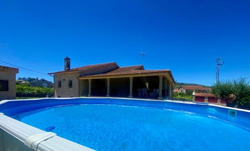 Pazos de Borben House | Serene O Eido da Barreira: Oceanfront Retreat with Pool