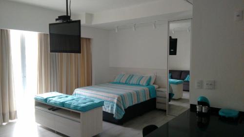 Pompeia Apartment | Ideal Getaway for Relaxation and Oceanfront Views