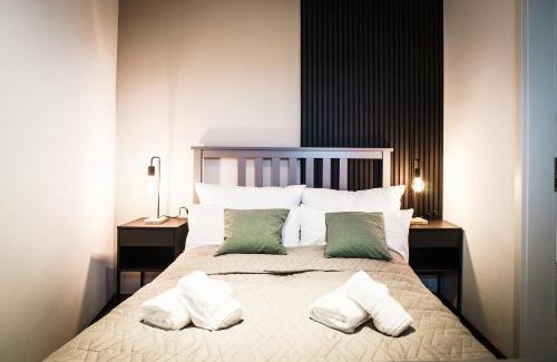Ibbenbueren Apartment | Modern Design Hotel with Kitchen & Parking in Central Location