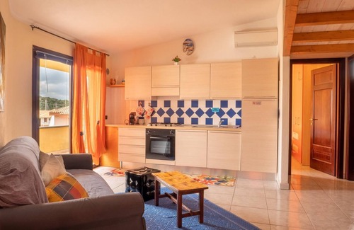 Porto Ottiolu Apartment | Cozy Oasis Near Beach with Ocean Views and Pet-Friendly Amenities