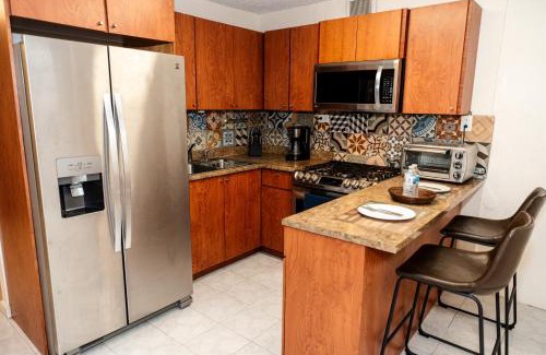 Bucana Apartment | Relaxing Oasis on the Island with Free Parking & Laundry