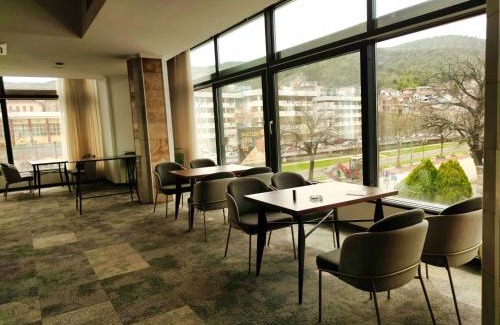 Stip Hotel | Discover Oaza Hotel: Family-Friendly with Pool & Dining