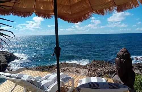 Point Blanche Apartment | Exceptional Océan Cave: Poolside Retreat with Dining Options