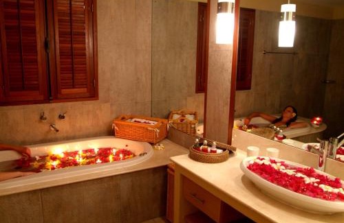 Pereybere Hotel | Ocean Beauty: Relax by the Private Beach and Poolside Haven