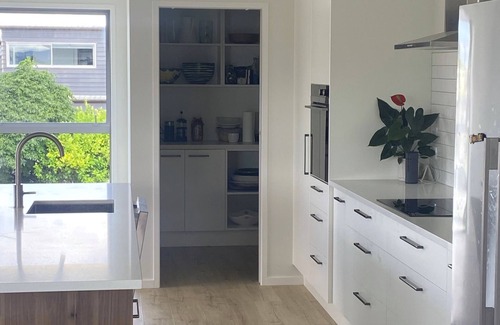 Whangamata House | Ocean Bliss Retreat: Modern 4-Bedroom Home Steps from Beach and Shops