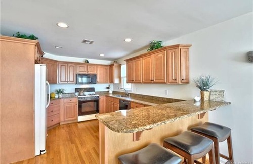 Surf City House | Beachside Retreat with Rooftop Deck and Family Amenities