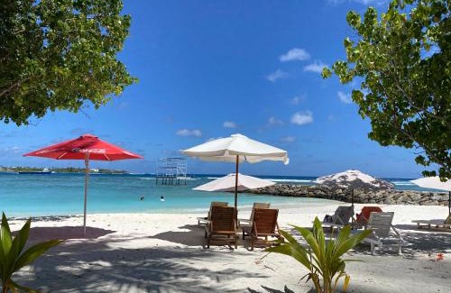Thulusdhoo Island House | Premier Ocean Cottage Maldives - Guest Rated 10/10!