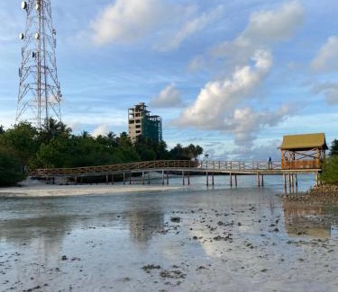Thulusdhoo Island House | Premier Ocean Cottage Maldives - Guest Rated 10/10!