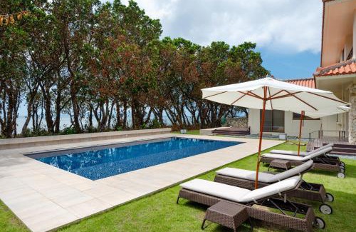 Taketomi-jima Taketomi-cho Villa | Ocean Front Villa Ishigakijima: Pool & Family-Friendly Stay