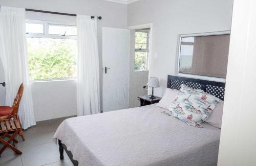 Shaka's Rock Apartment | Discover Ocean Gorge Seafront Getaway: Pet-Friendly Retreat