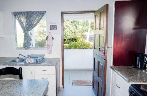 Shaka's Rock Apartment | Discover Ocean Gorge Seafront Getaway: Pet-Friendly Retreat