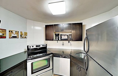 Galt Mile Resort | Ocean Manor: En-Suite Comfort with Pool & Ocean Views