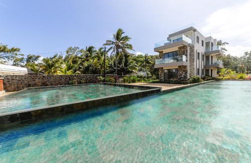 Poste Lafayette Apartment | Experience Ocean Terraces Apt A1: Beachfront Paradise Awaits