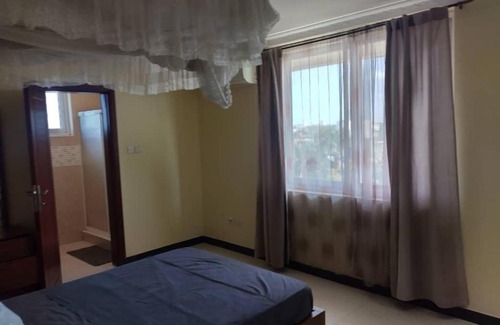 Msasani Apartment | Cozy Ocean View 2-Bedroom Apt with Pool & Hot Tub Access