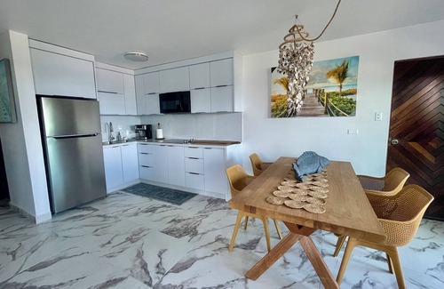 Tierras Nuevas Saliente Apartment | Beachfront Ocean View Apartment with Patio & BBQ Access
