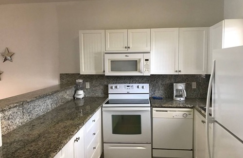 Alice Town Apartment | Stunning Ocean View Condo Steps from Private Beach