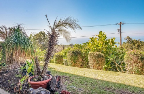 Honalo Condo | Ocean-view condo in great location with outdoor pool, sports courts, & lanai
