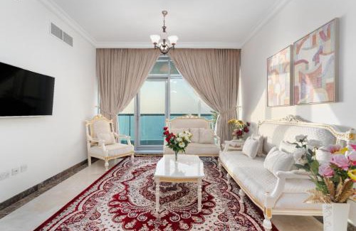 Rumailah Apartment | Ocean View Suites: 4-Star Experience with Hot Tub & Pool