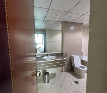Rumailah Apartment | Ocean View Suites: 4-Star Experience with Hot Tub & Pool
